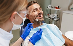 a patient undergoing a dental checkup and cleaning