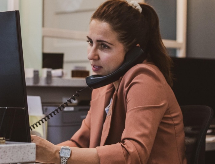 Dental team member talking on phone