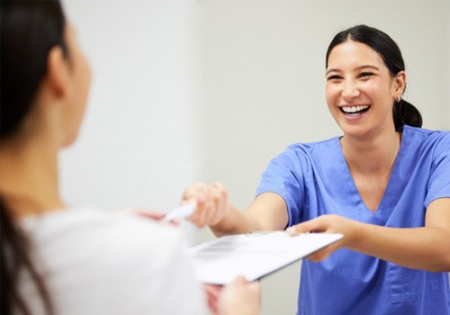 Patient in Phoenix with dental crowns smiling